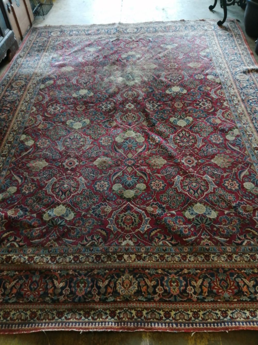 A Kashan red ground carpet, 370 x 276cm